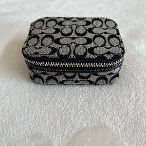 Coach signature pill box
